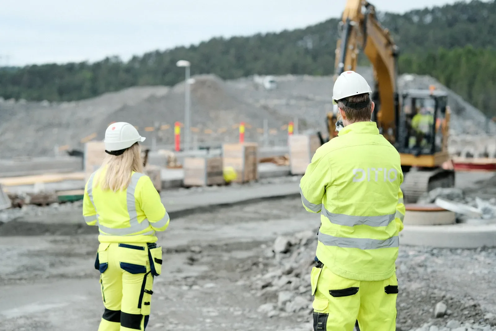 Ditio users on a road and civil engineering project with material and an excavator
